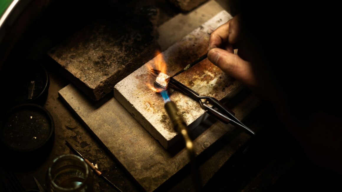 a person lighting a candle